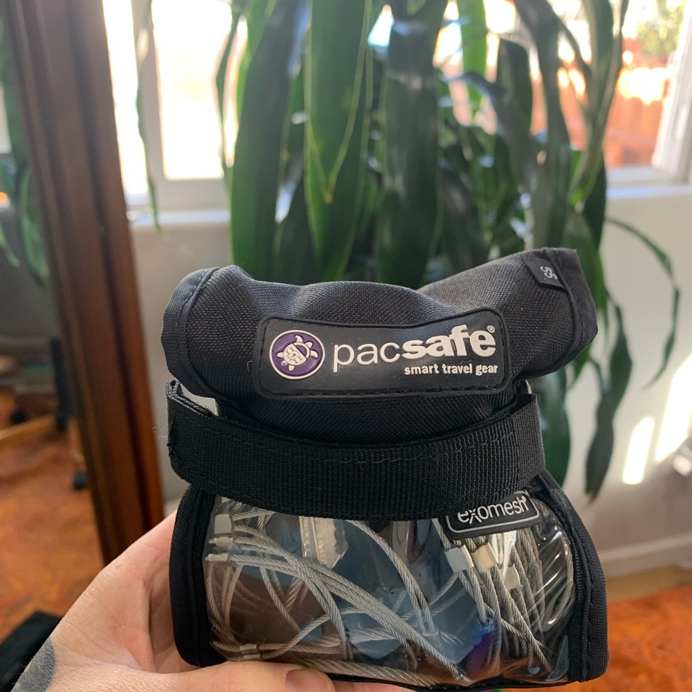 Pacsafe backpack protector/cage BRAND NEW never used
